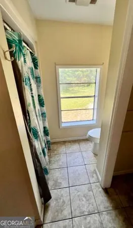 a view of an entryway with a window