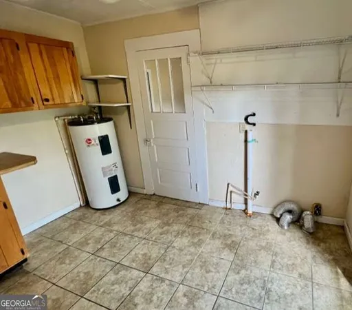 a view of a storage & utility room with stuff
