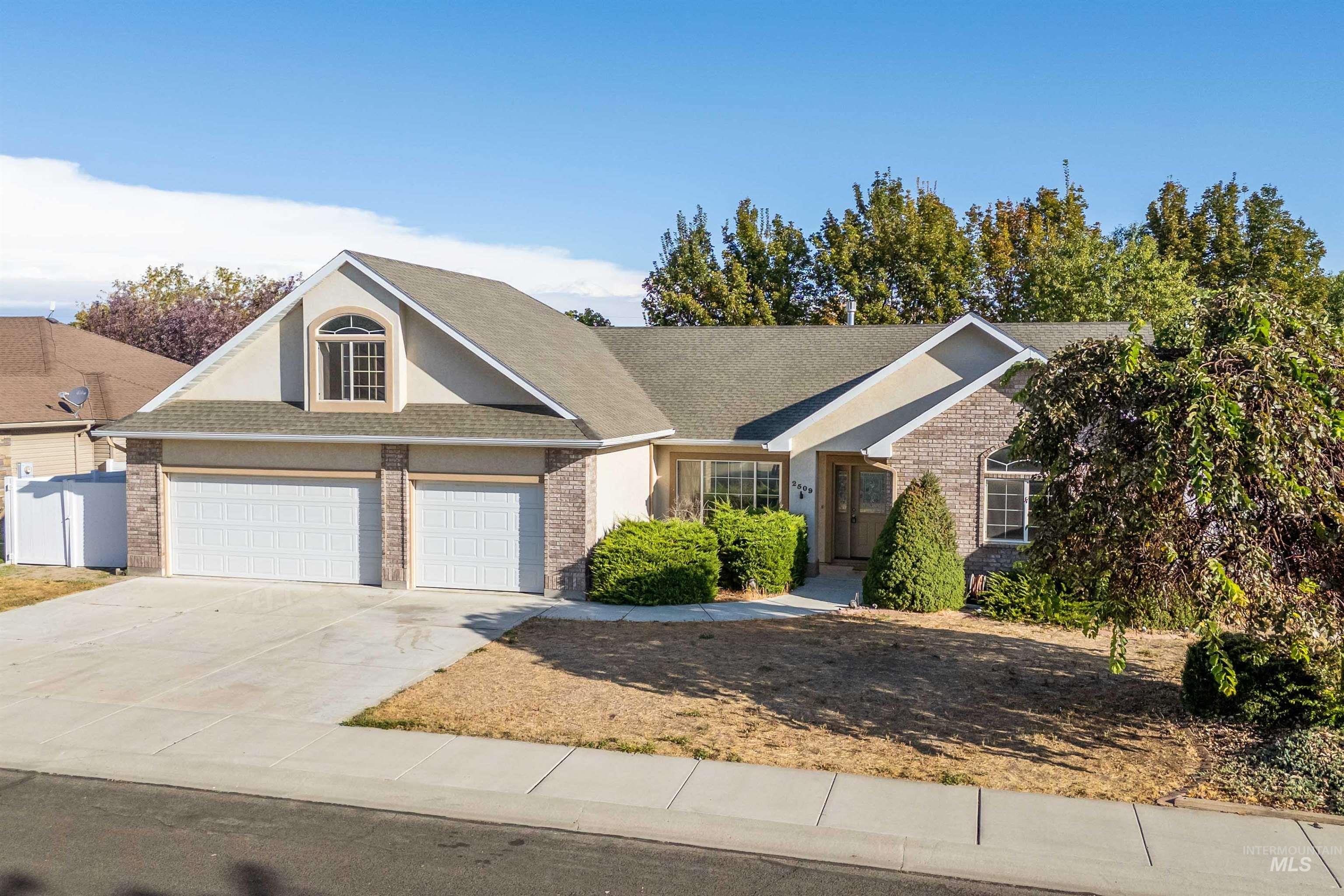 2509 Cedar Ridge Road Twin Falls, ID 83301 - Photo 1 of 36 Brick and stucco exterior with a three-car garage