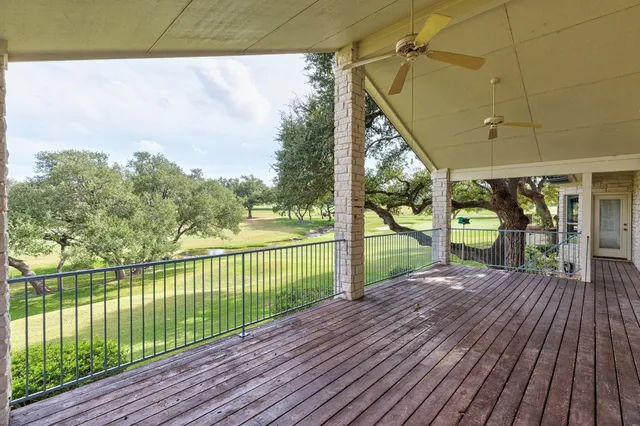 a view of a lake with a yard