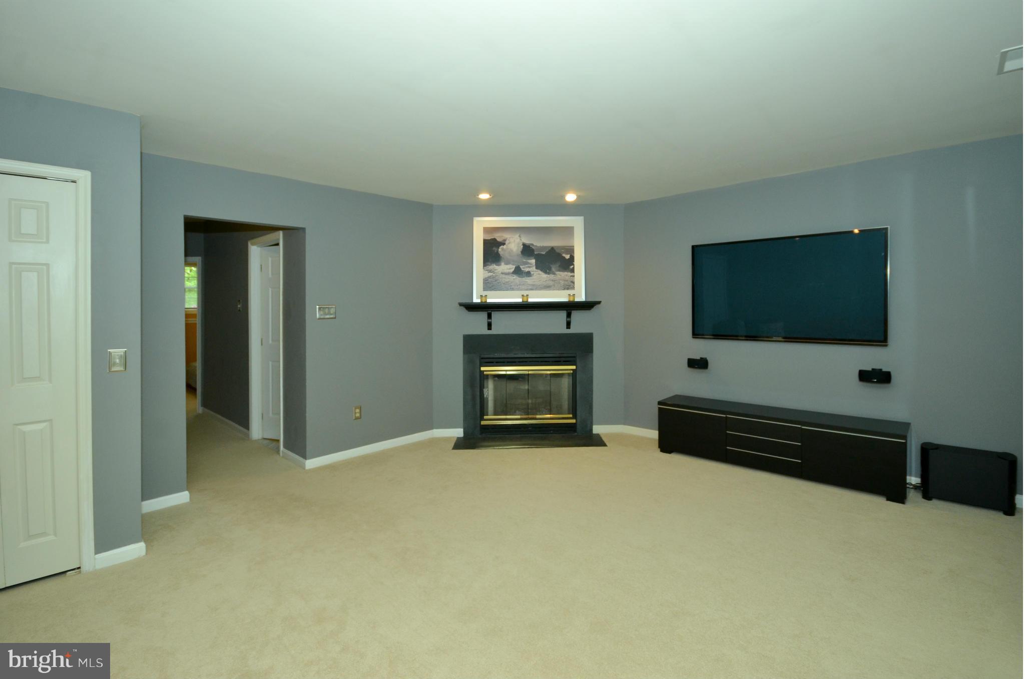 936 Walnut Wood Road Cockeysville, MD 21030 - Photo 18 of 27 Family Room w/ fireplace. TV included!