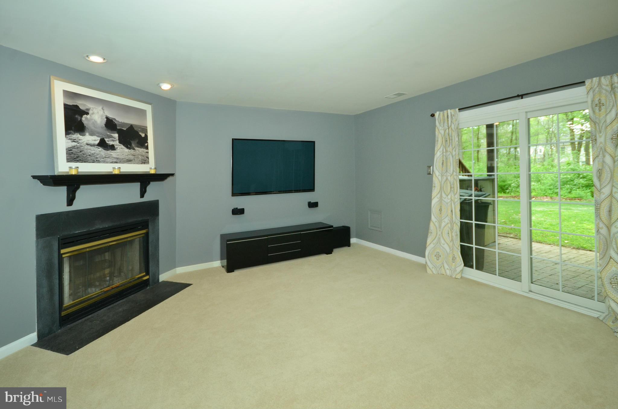936 Walnut Wood Road Cockeysville, MD 21030 - Photo 19 of 27 Family Room w/ fireplace and slider to patio