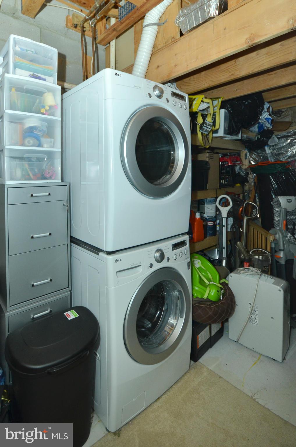 936 Walnut Wood Road Cockeysville, MD 21030 - Photo 22 of 27 Utility room w/ washer/dryer & storage