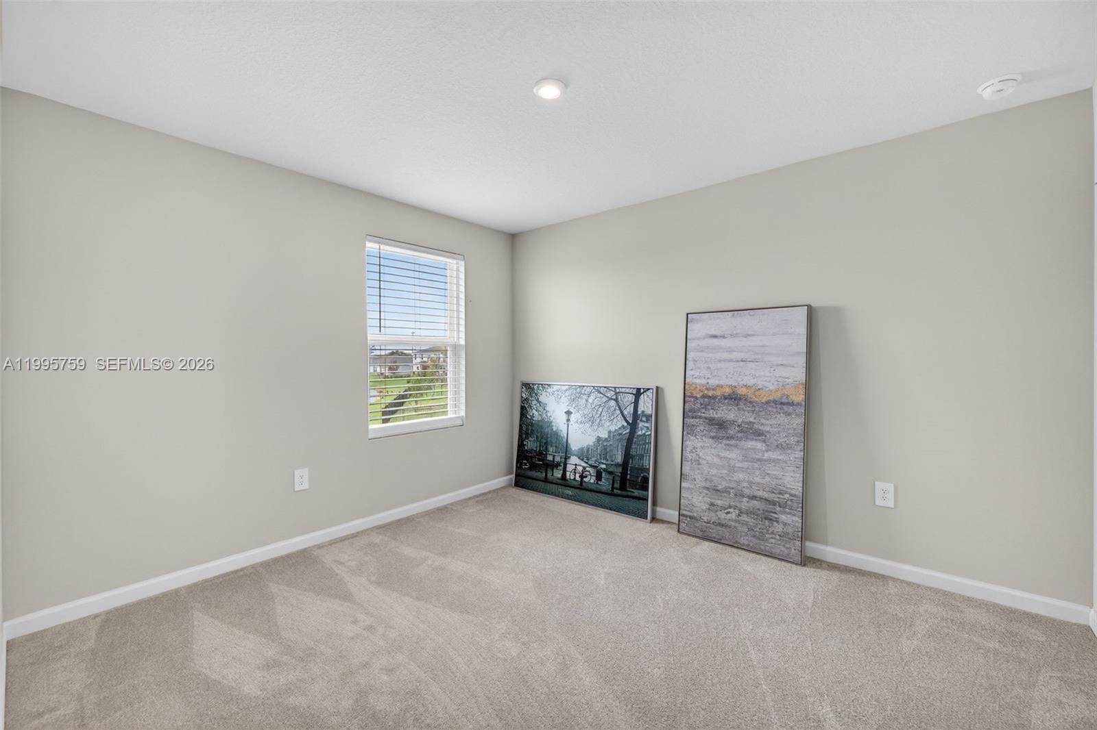 220 Raspberry Road Fort Pierce, FL 34981 - Photo 29 of 43 an empty room with windows