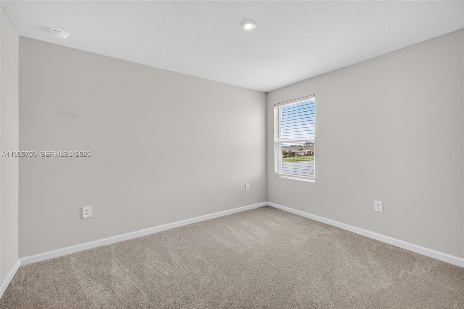 220 Raspberry Road Fort Pierce, FL 34981 - Photo 33 of 43 an empty room with a window