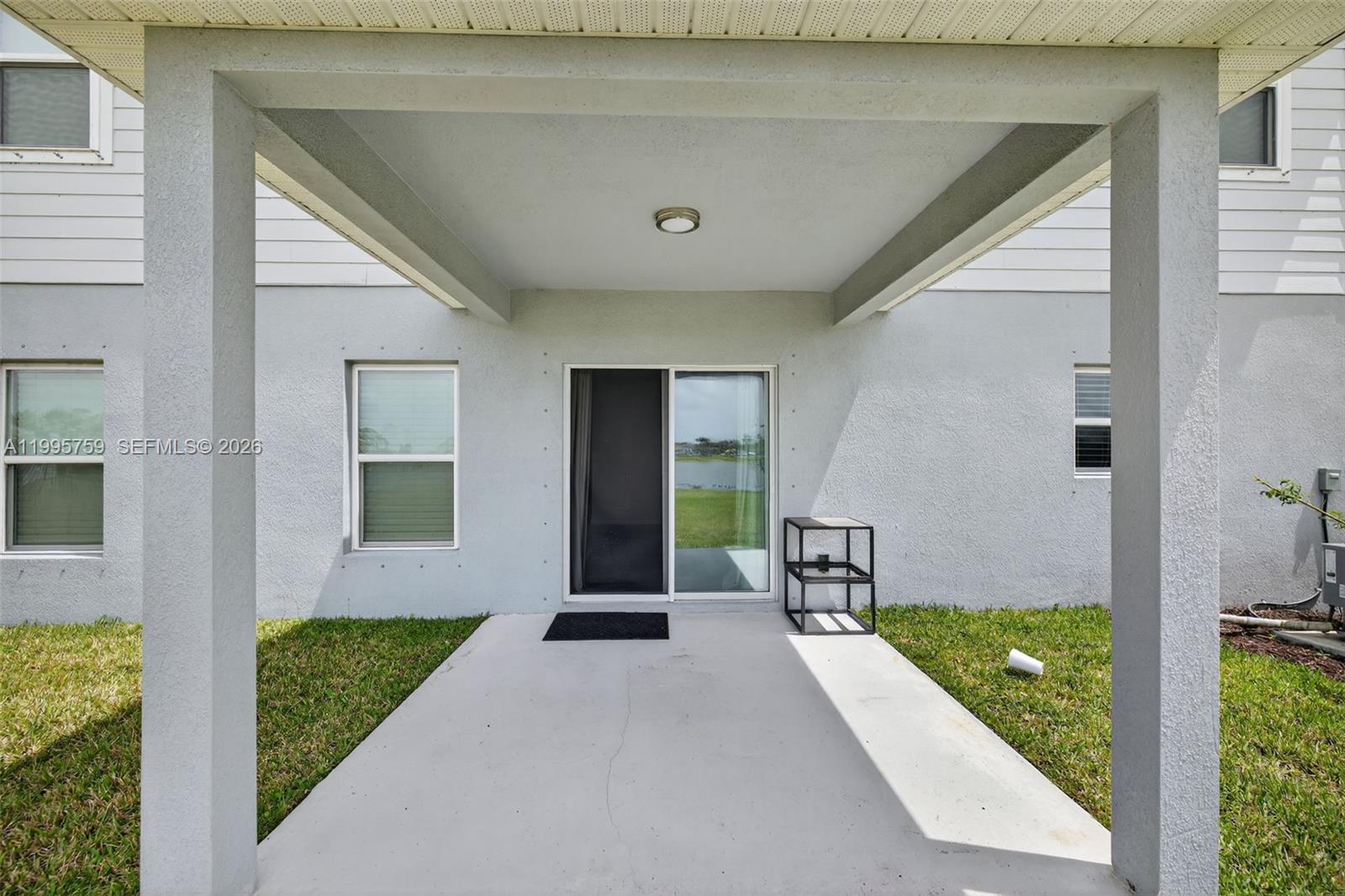 220 Raspberry Road Fort Pierce, FL 34981 - Photo 38 of 43 a front view of a house with garden