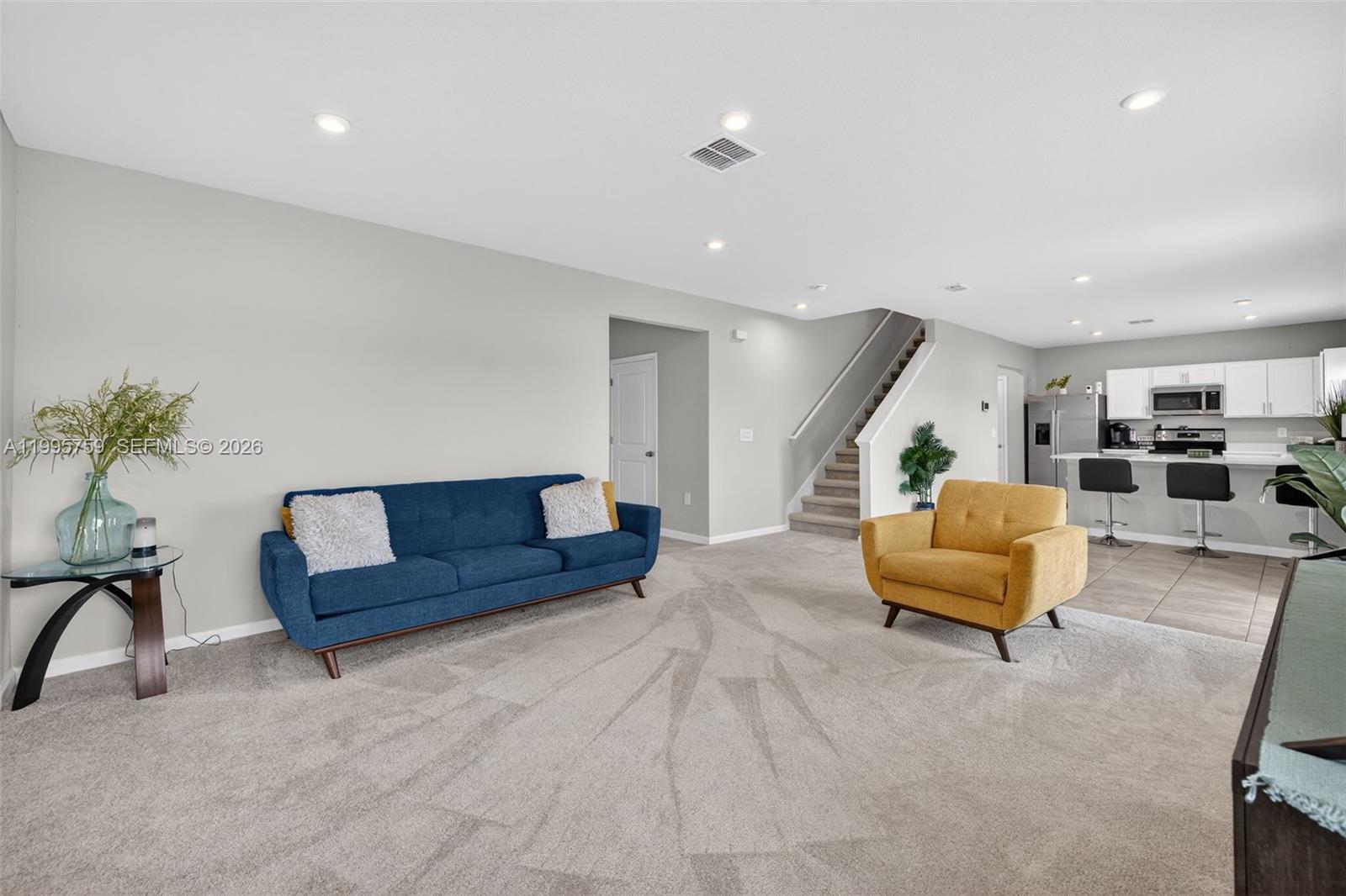 220 Raspberry Road Fort Pierce, FL 34981 - Photo 10 of 43 a living room with furniture and a couch
