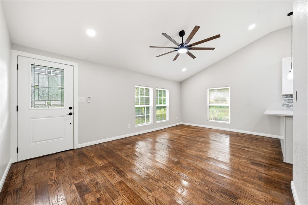 3313 South 3rd Street Waco, TX 76706 - Photo 3 of 28 a view of empty room with wooden floor and fan