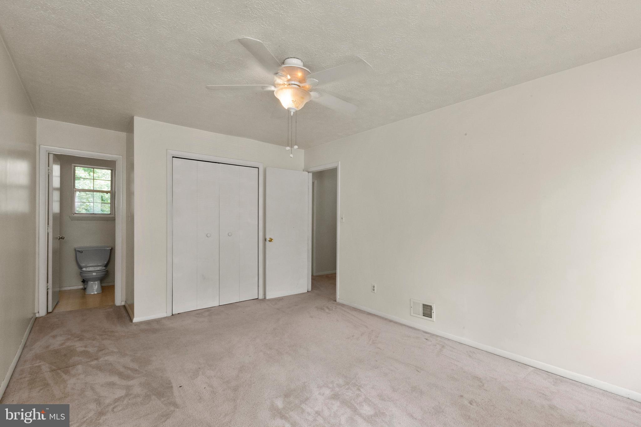 567 Balsom Road Lusby, MD 20657 - Photo 22 of 37 Master bedroom with attached master bath