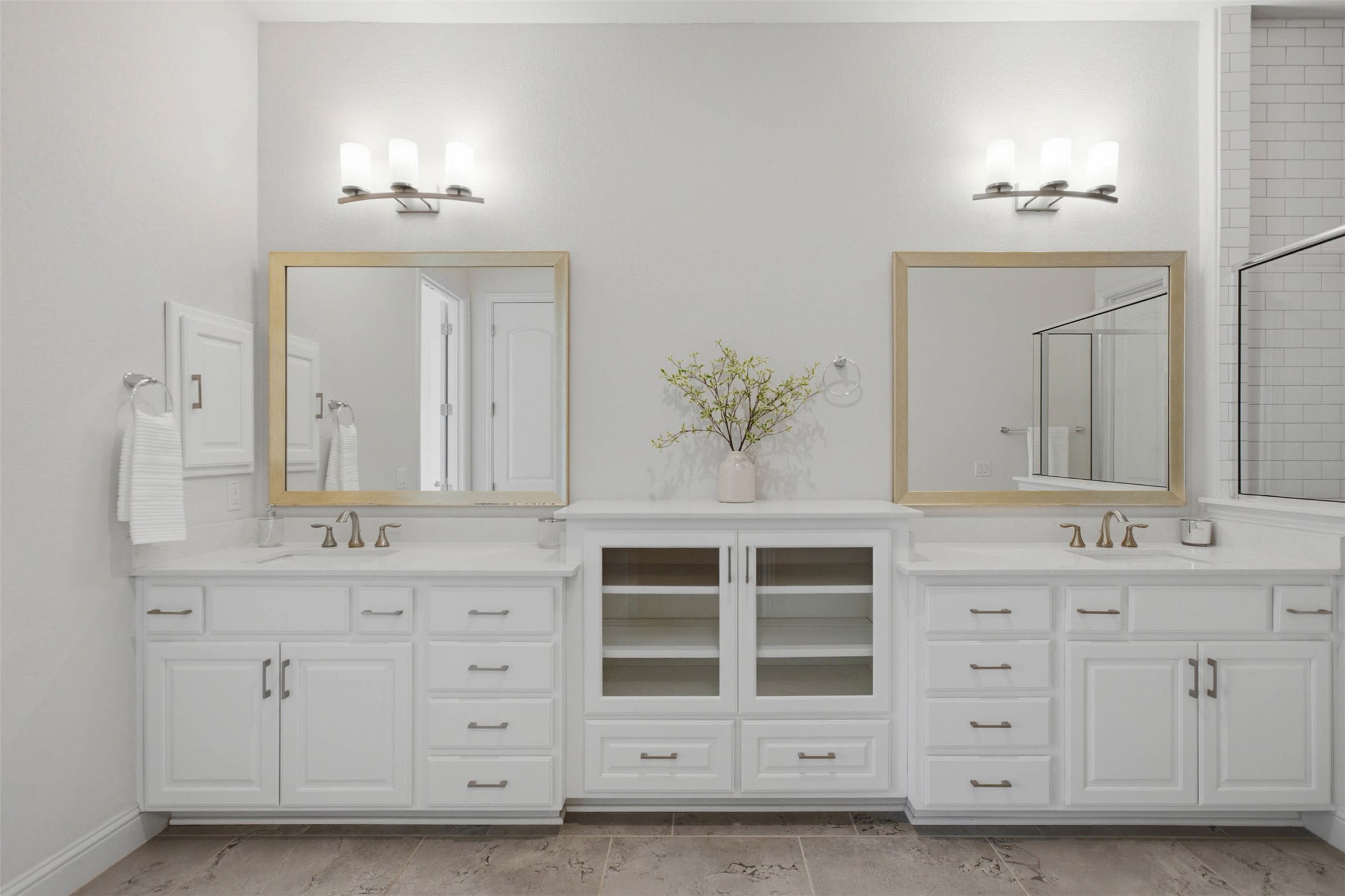 213 Diamondback Drive Georgetown, TX 78628 - Photo 9 of 37 A well-appointed primary bathroom featuring twin vanities and ample storage.