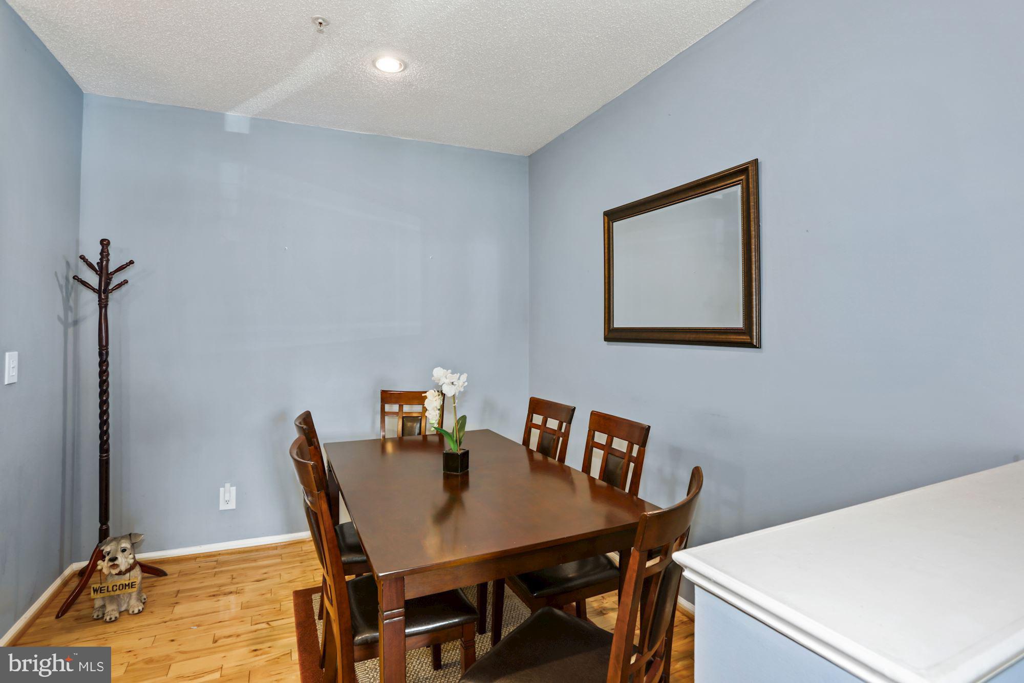 1720 Lake Shore Crest Drive, Unit 22 Reston, VA 20190 - Photo 12 of 35 Separate Dining Room with Hardwood floors
