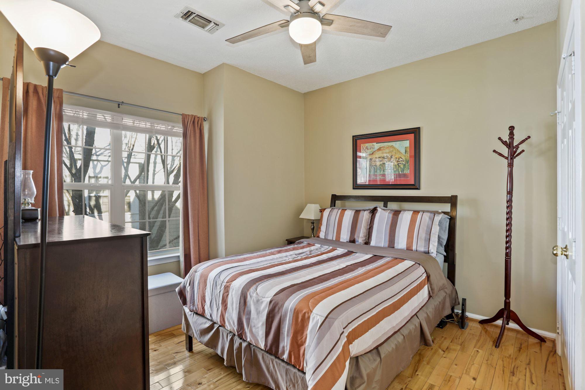 1720 Lake Shore Crest Drive, Unit 22 Reston, VA 20190 - Photo 21 of 35 Bedroom #2 with Ceiling Fan & lots of light!