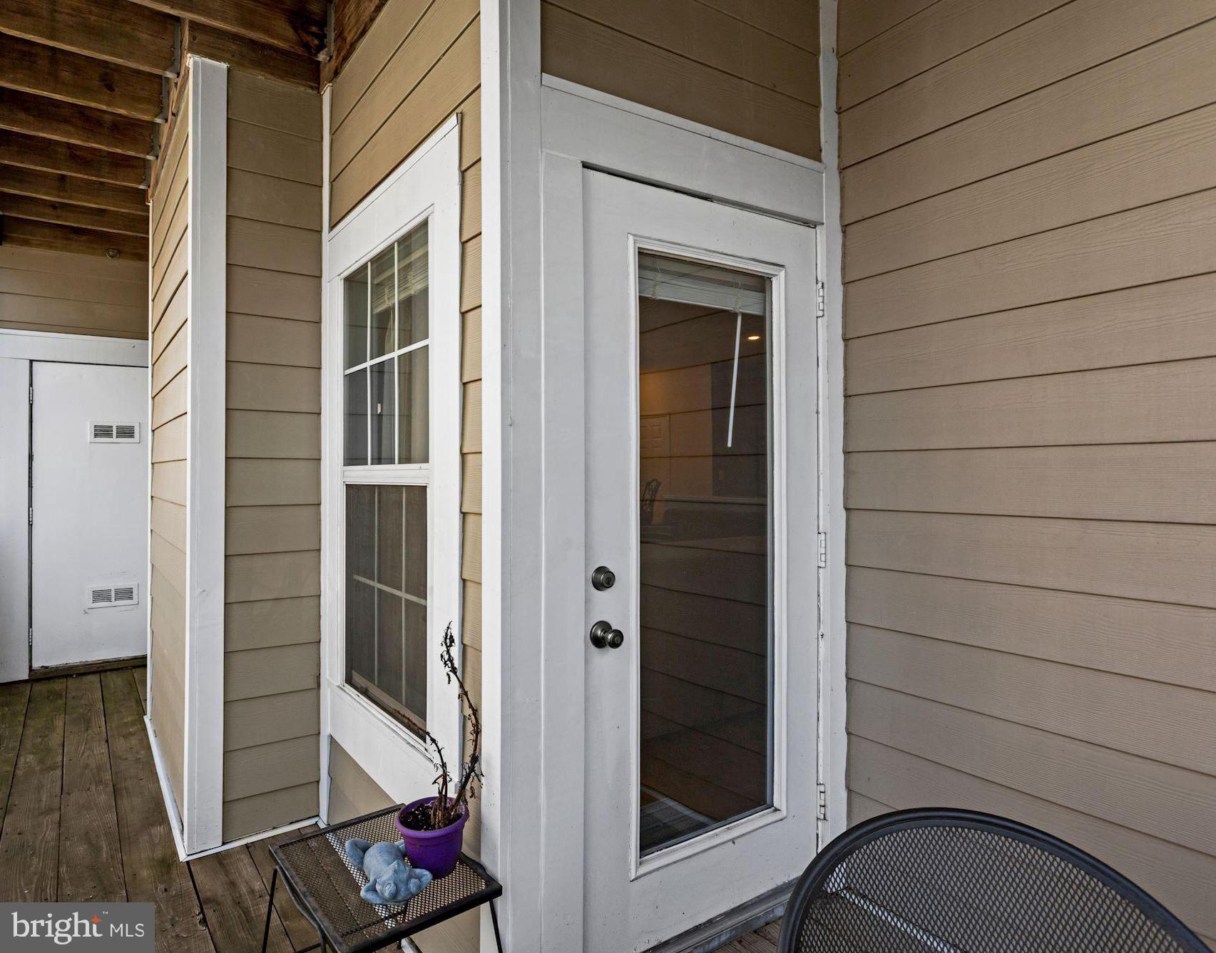 1720 Lake Shore Crest Drive, Unit 22 Reston, VA 20190 - Photo 29 of 35 Spacious deck patio to enjoy a Sunset!