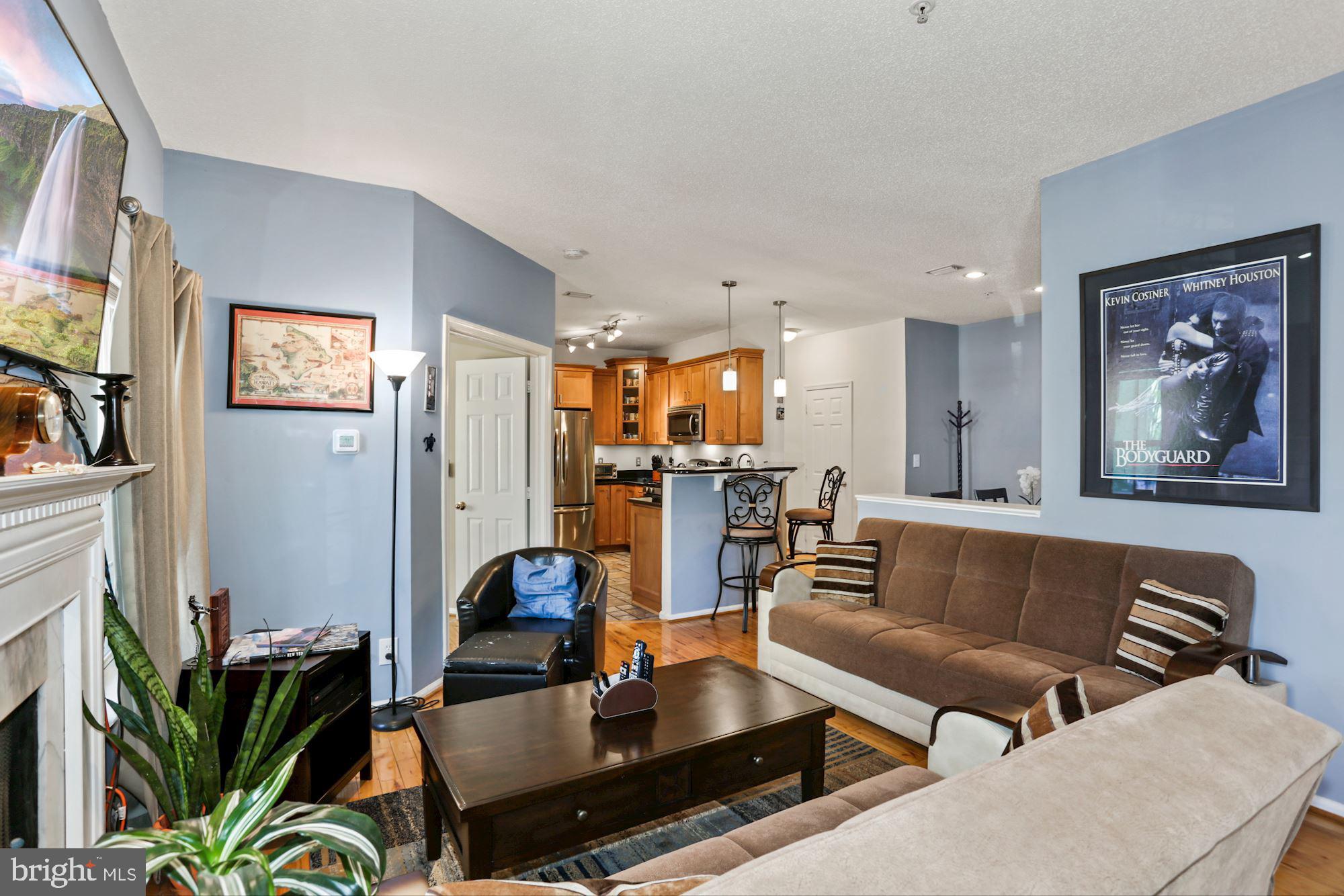1720 Lake Shore Crest Drive, Unit 22 Reston, VA 20190 - Photo 10 of 35 Gleaming Hardwood floors in Living & Dining rooms