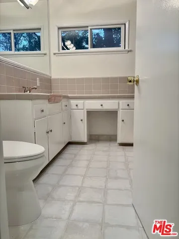 a view of yard with patio and furniture