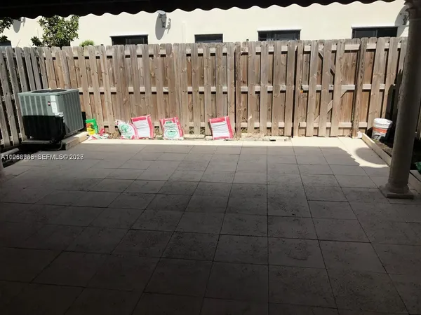 a view of outdoor space with electric cars