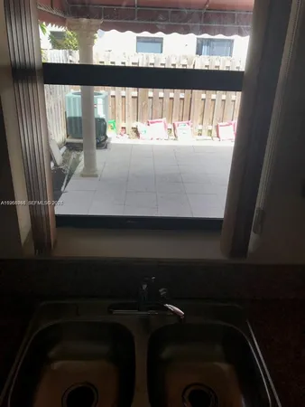 a view of balcony and furniture