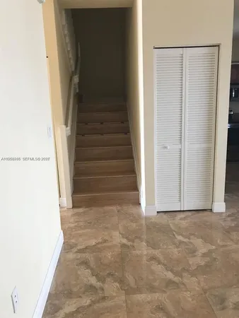 a view of entryway with stairs