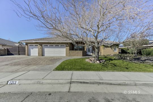 1213 Carolyn Street Ridgecrest, CA 93555 - Photo 1 of 50 front view of a house with a yard