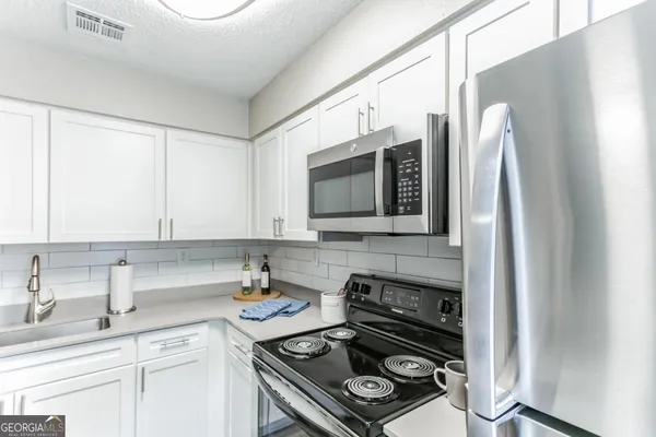 $1,401 | 1067 Pitts Road, Unit 1043F, Sandy Springs, GA 30350