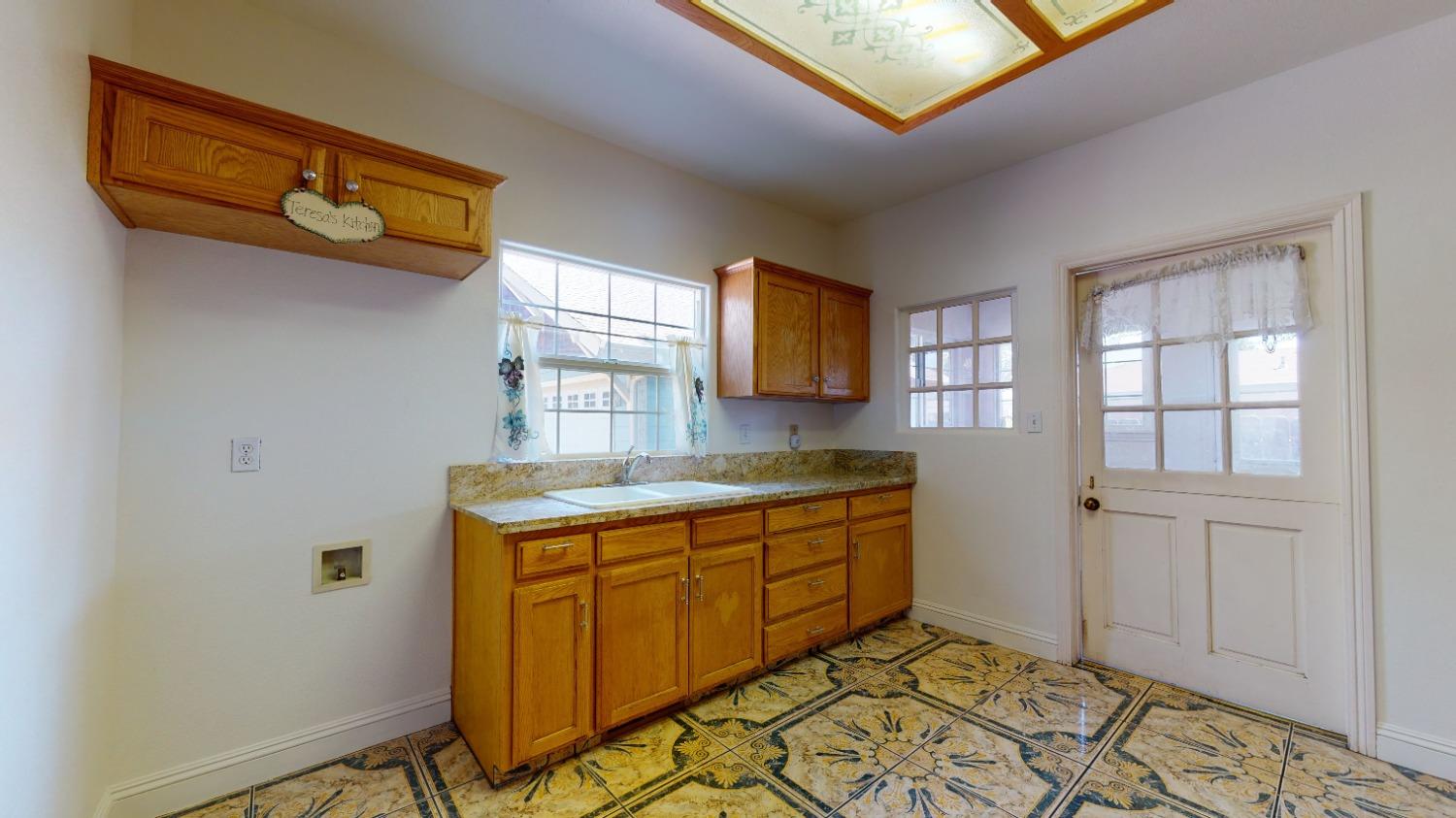926 North Frankwood Avenue Reedley, CA 93654 - Photo 11 of 32 a room with storage and utility
