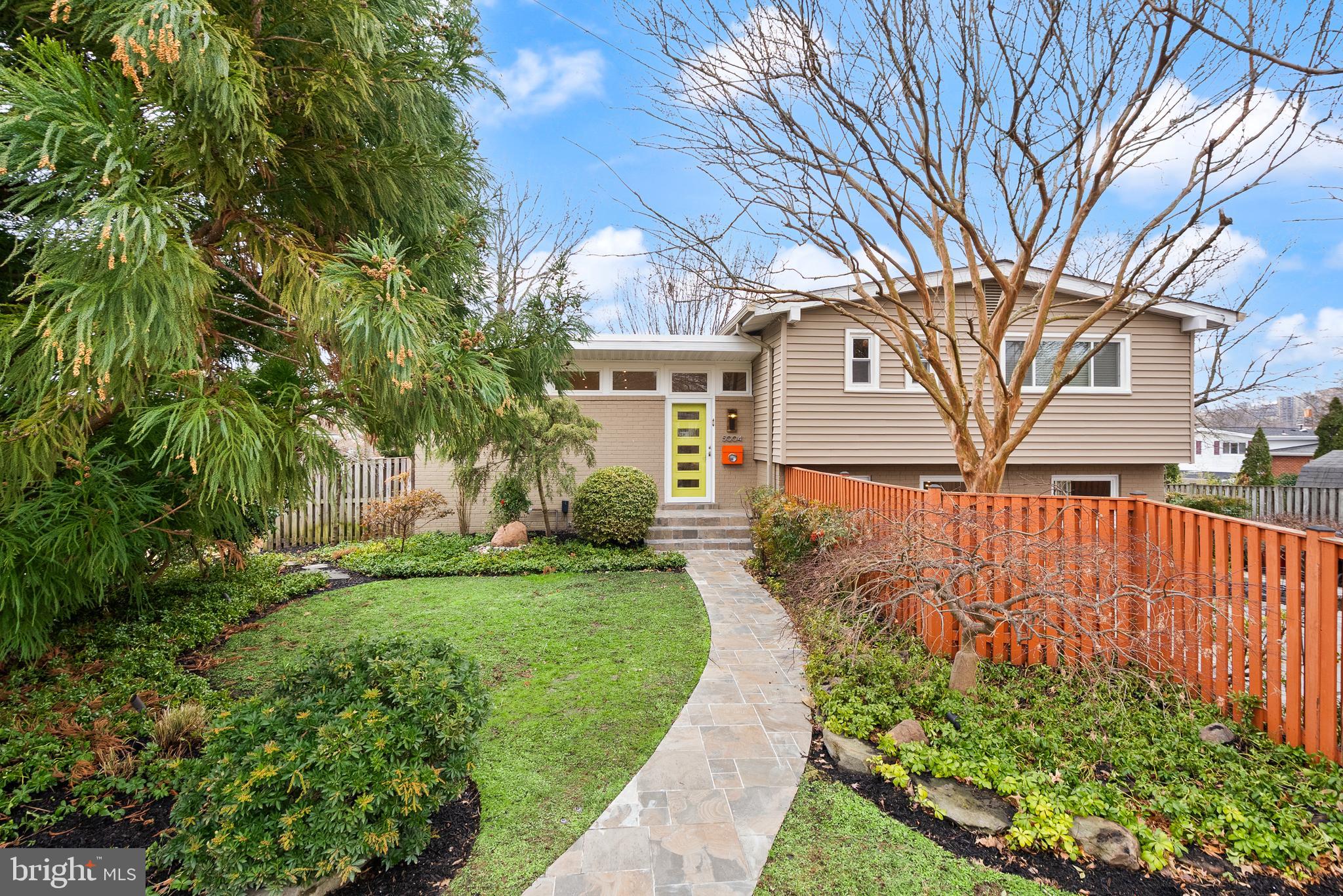 5004 Regency Place Alexandria, VA 22304 - Photo 1 of 36 a front view of a house with a yard