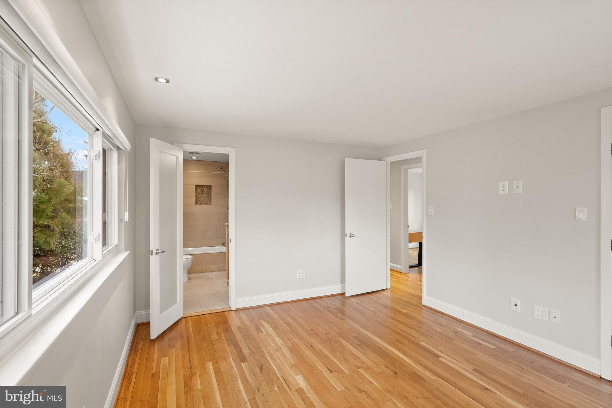 5004 Regency Place Alexandria, VA 22304 - Photo 14 of 36 a view of empty room with wooden floor and fan