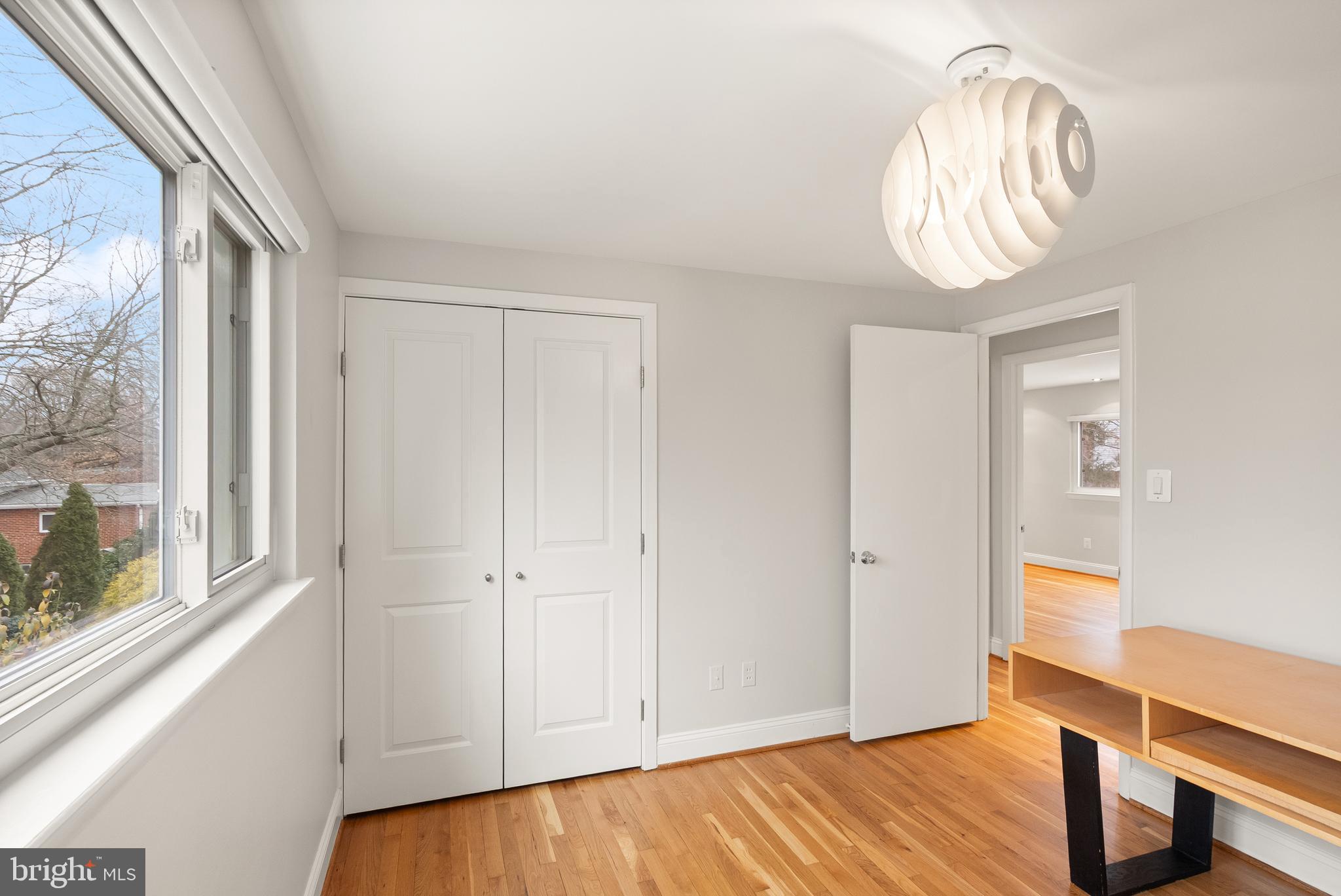 5004 Regency Place Alexandria, VA 22304 - Photo 19 of 36 a view of empty room with wooden floor and fan