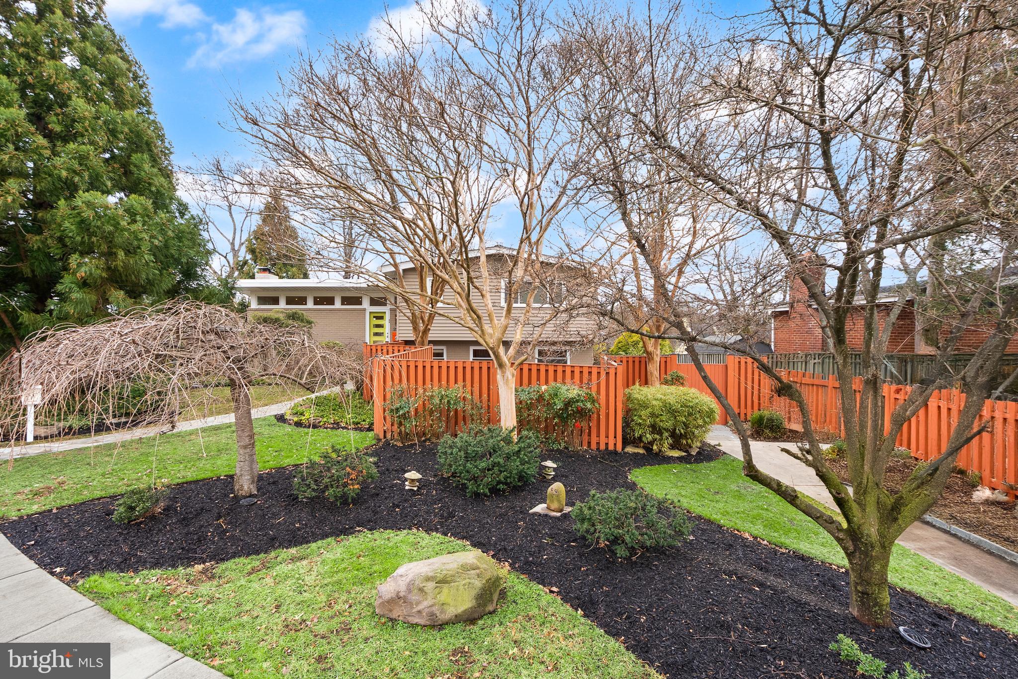 5004 Regency Place Alexandria, VA 22304 - Photo 2 of 36 a view of a backyard with large trees