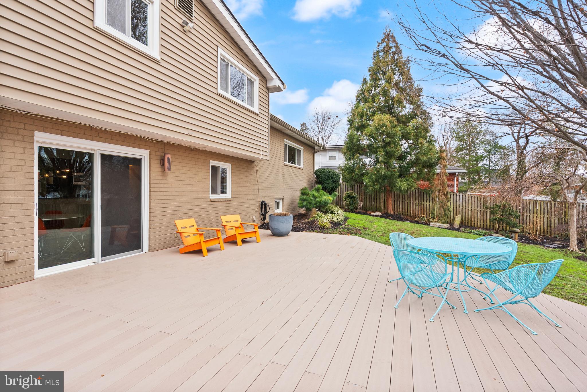 5004 Regency Place Alexandria, VA 22304 - Photo 26 of 36 a wooden bench sitting in front of a house