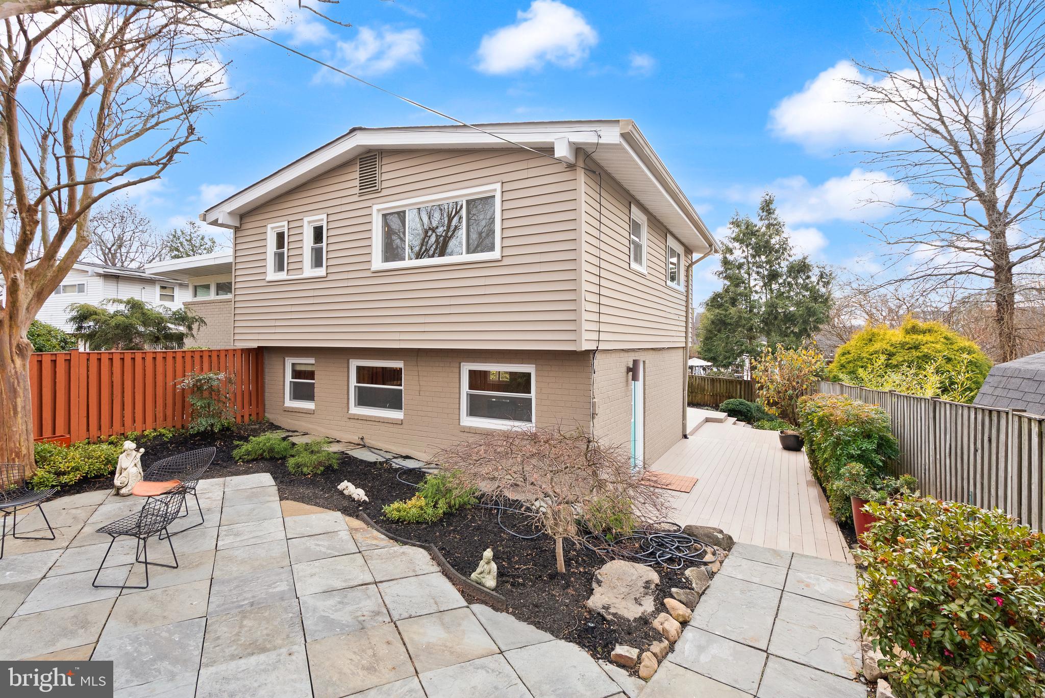 5004 Regency Place Alexandria, VA 22304 - Photo 30 of 36 a front view of house with yard and trees around