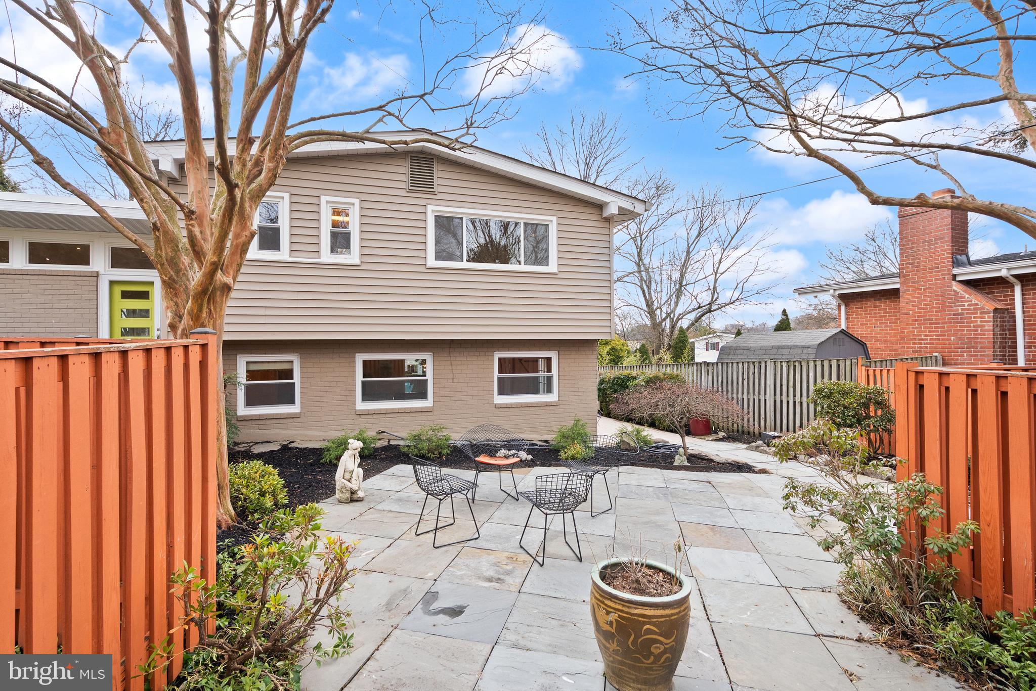 5004 Regency Place Alexandria, VA 22304 - Photo 34 of 36 a view of a patio with couches table and chairs and potted plants
