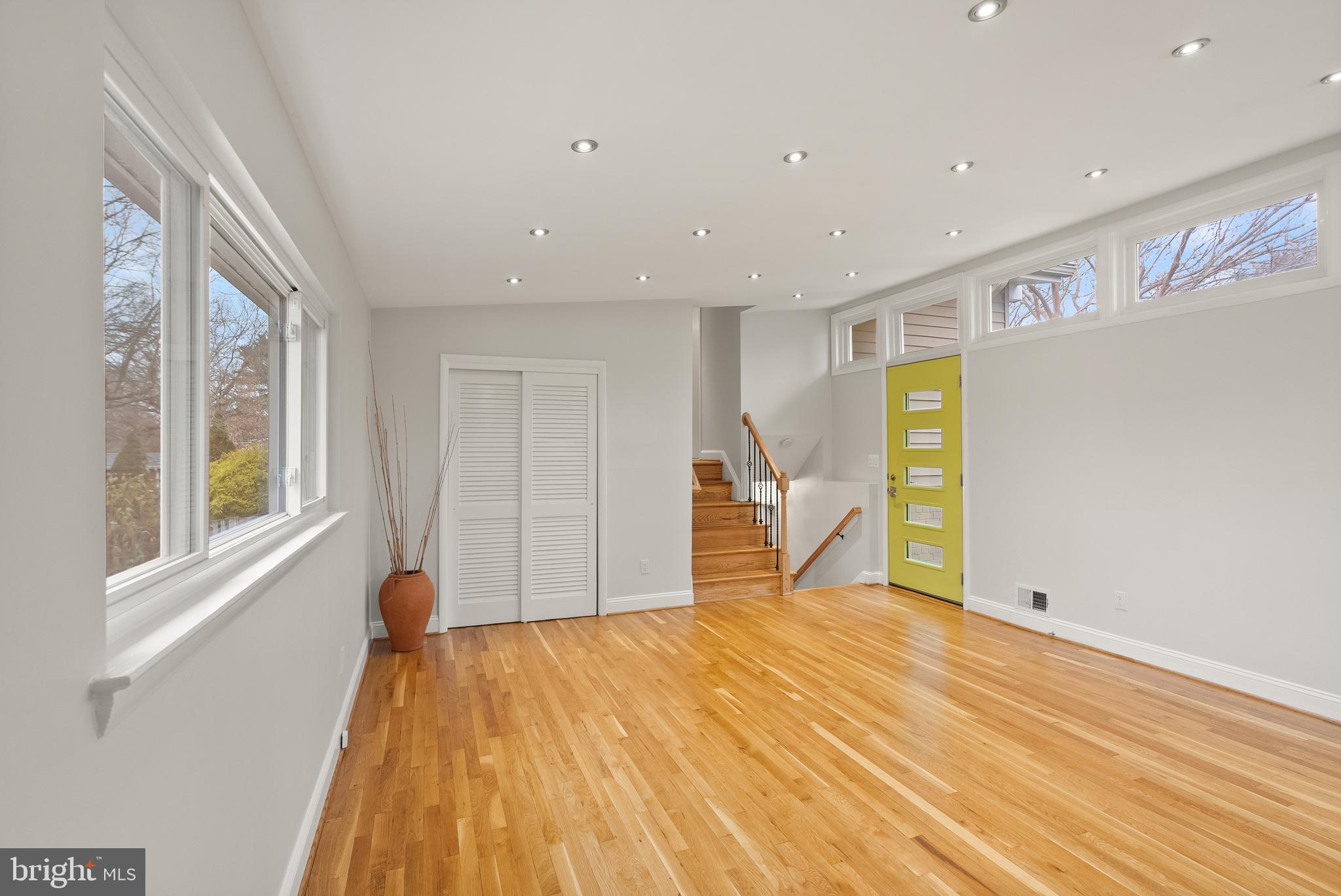 5004 Regency Place Alexandria, VA 22304 - Photo 5 of 36 a view of a big room with wooden floor and windows