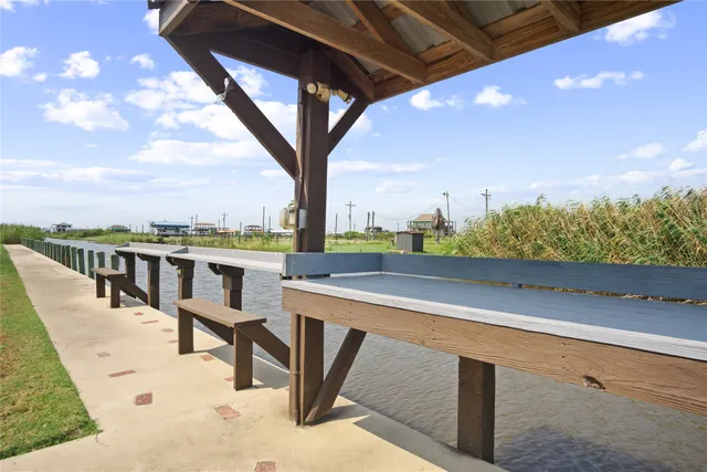 a view of a swimming pool with a lounge chairs