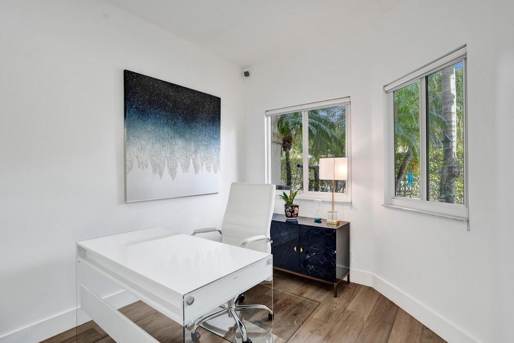 6800 Via Regina Boca Raton, FL 33433 - Photo 15 of 58 a room with table and window