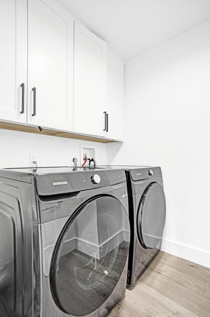 6800 Via Regina Boca Raton, FL 33433 - Photo 42 of 58 a utility room with sink dryer and washer