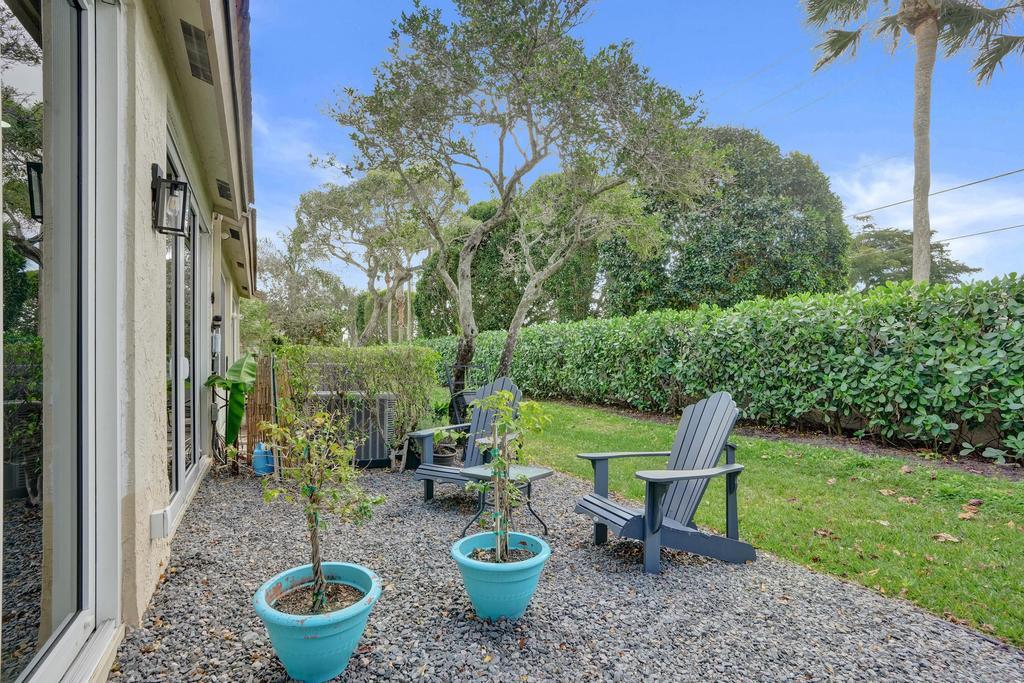 6800 Via Regina Boca Raton, FL 33433 - Photo 44 of 58 a view of a patio with chairs and a potted plant