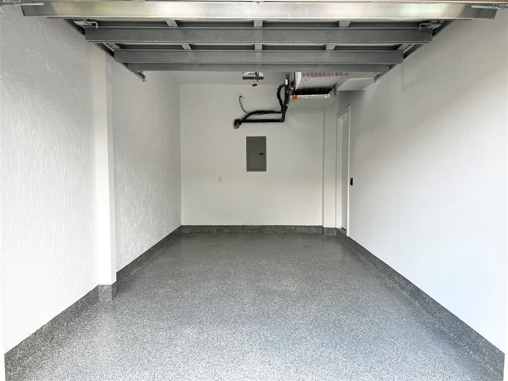 6800 Via Regina Boca Raton, FL 33433 - Photo 46 of 58 a view of a storage and utility room with a window