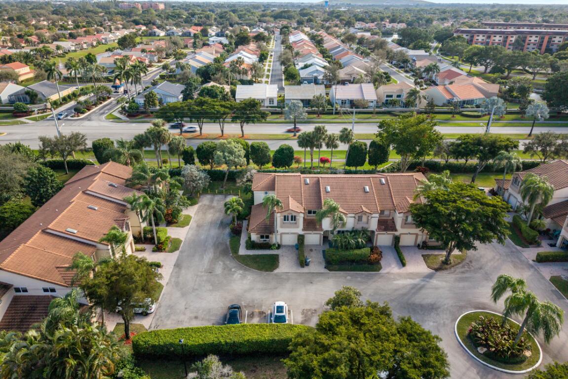 6800 Via Regina Boca Raton, FL 33433 - Photo 49 of 58 an aerial view of a house with garden space and lake view