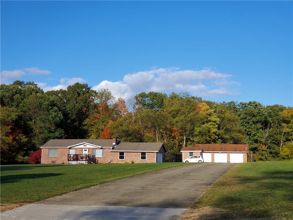 1502 County Line Road Champion, PA 15622 - Photo 1 of 22 a view of a house with a yard