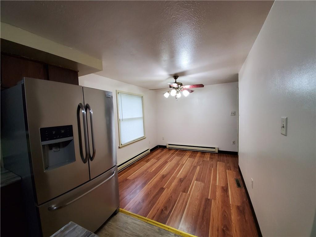 1502 County Line Road Champion, PA 15622 - Photo 9 of 22 a view of a livingroom with wooden floor