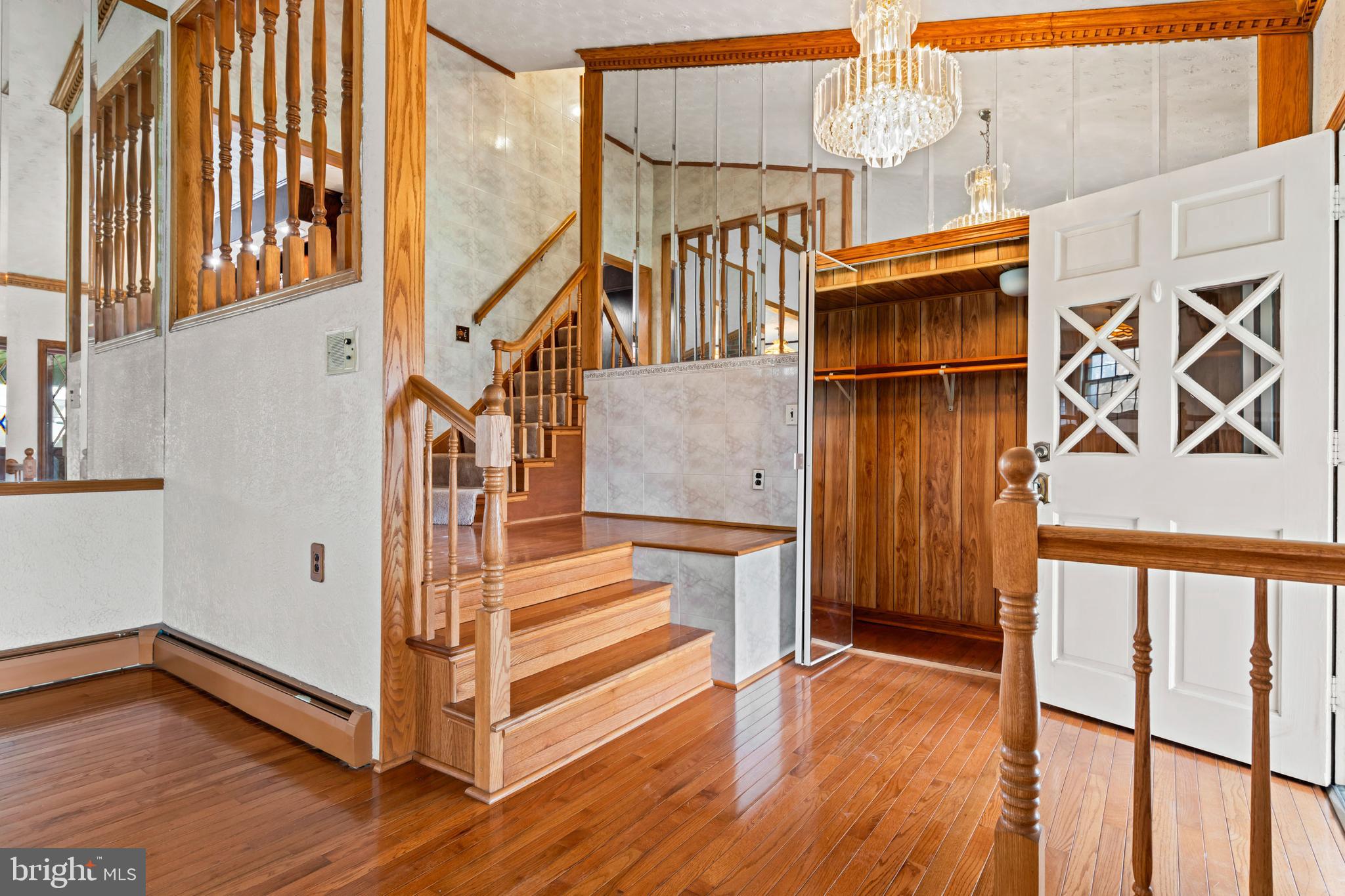 5030 Silver Spring Road Perry Hall, MD 21128 - Photo 27 of 97 a view of entryway with wooden floor and stairs