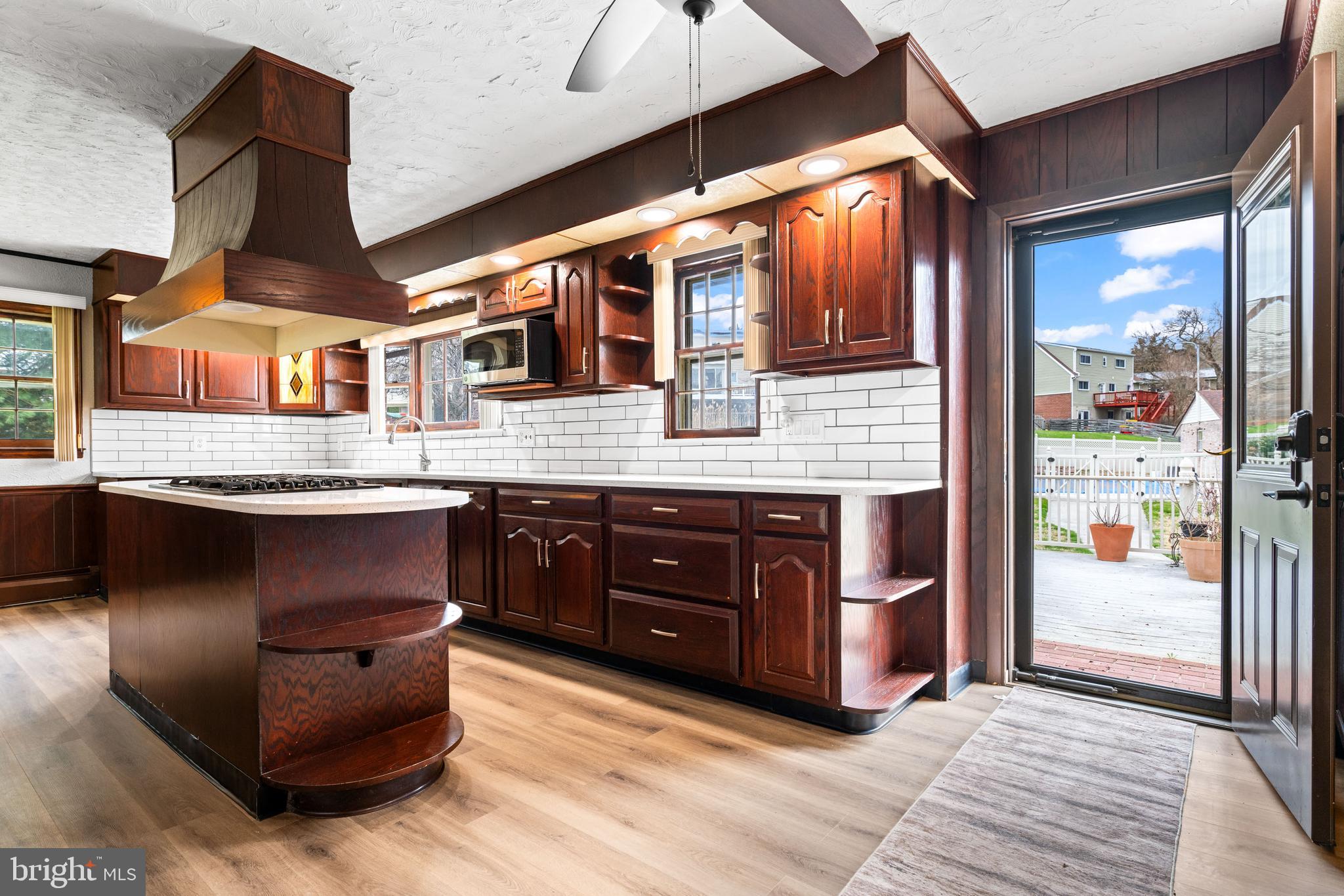 5030 Silver Spring Road Perry Hall, MD 21128 - Photo 37 of 97 a kitchen with stainless steel appliances granite countertop a stove and a sink
