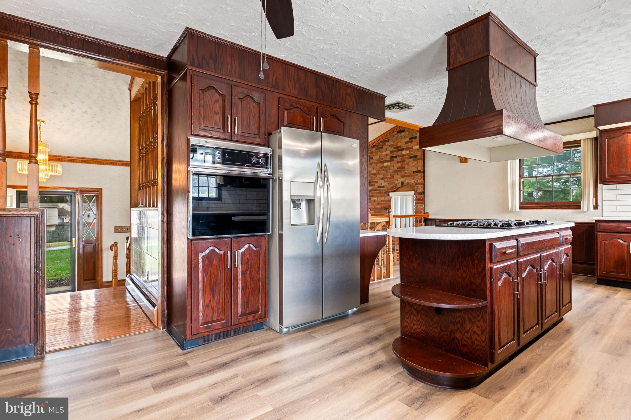 5030 Silver Spring Road Perry Hall, MD 21128 - Photo 39 of 97 a kitchen with stainless steel appliances granite countertop a refrigerator and a stove