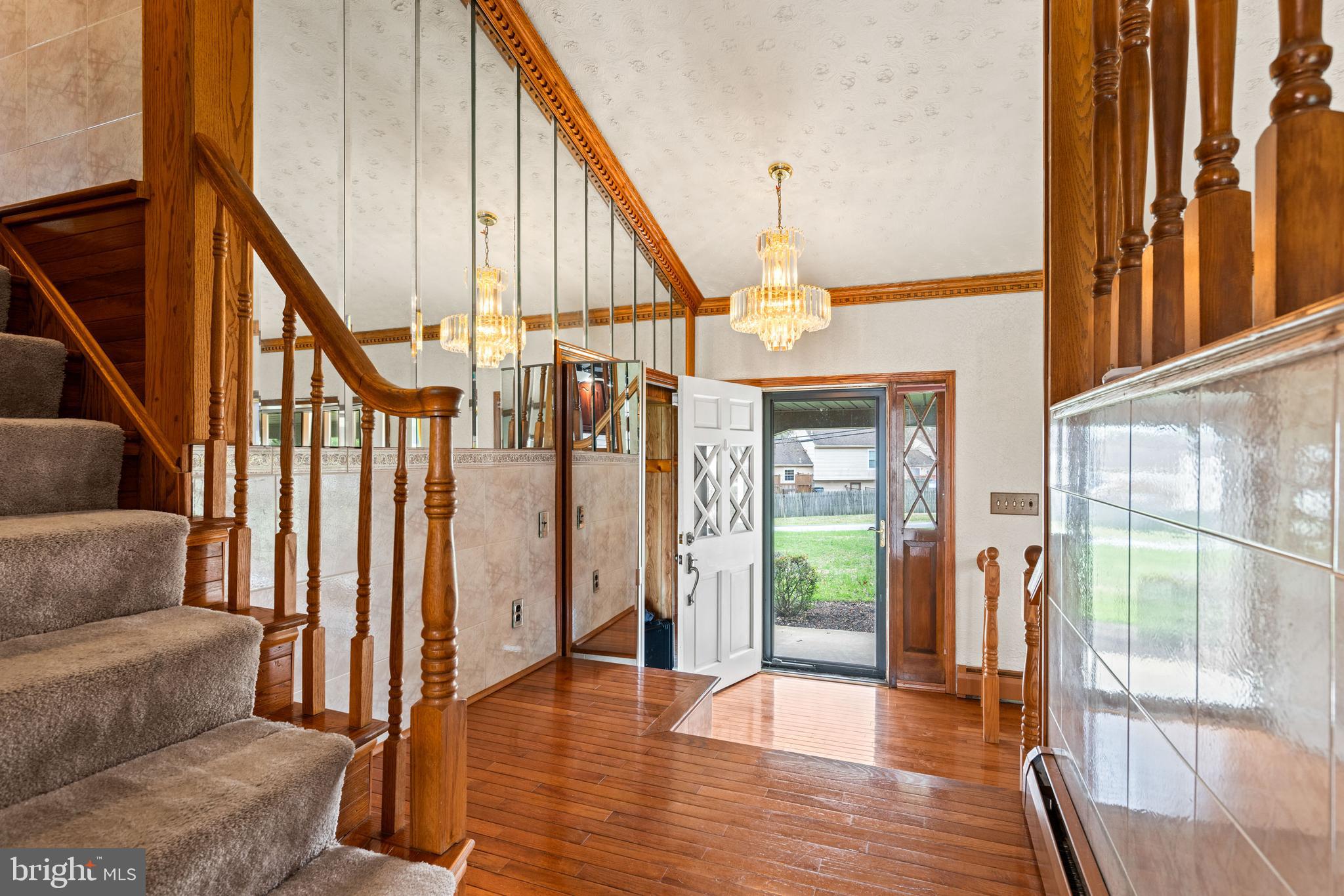 5030 Silver Spring Road Perry Hall, MD 21128 - Photo 41 of 97 a view of an entryway with wooden floor and door