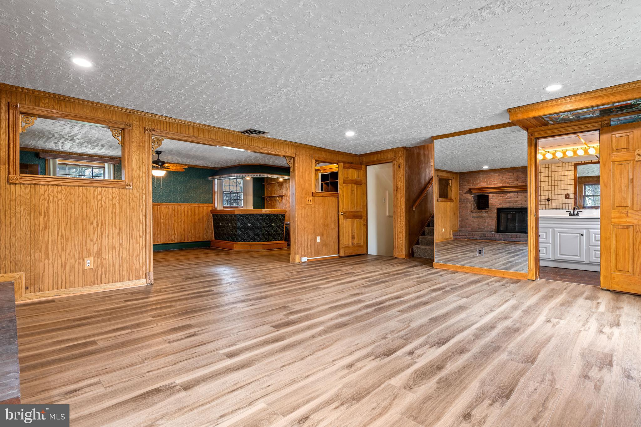 5030 Silver Spring Road Perry Hall, MD 21128 - Photo 58 of 97 a view of a living room with furniture and wooden floor