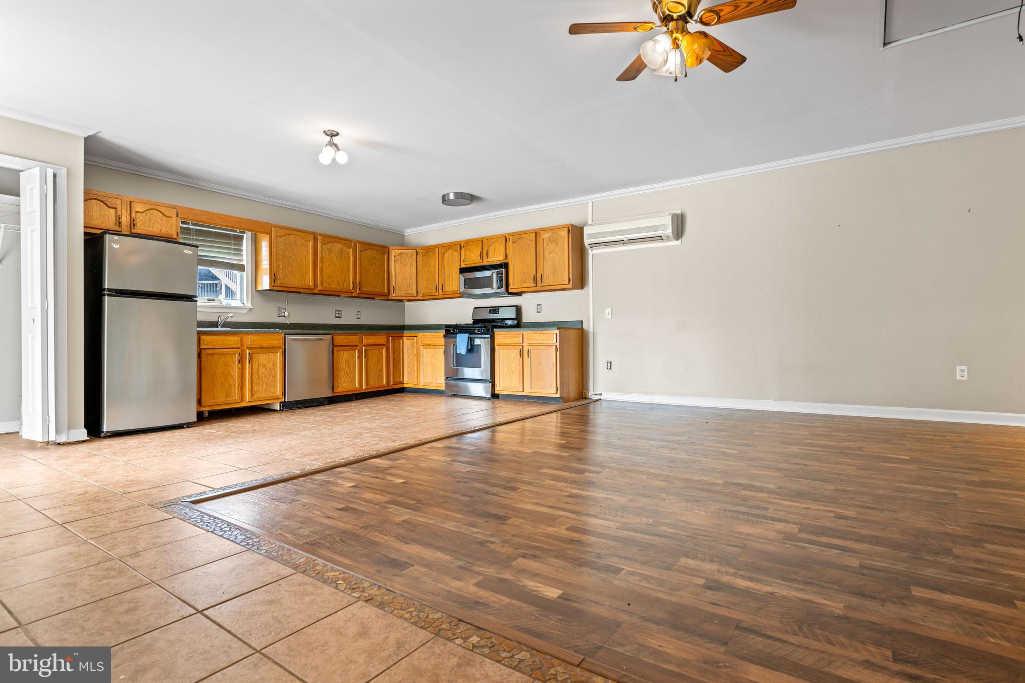 5030 Silver Spring Road Perry Hall, MD 21128 - Photo 79 of 97 a view of a kitchen with a sink and a stove top oven
