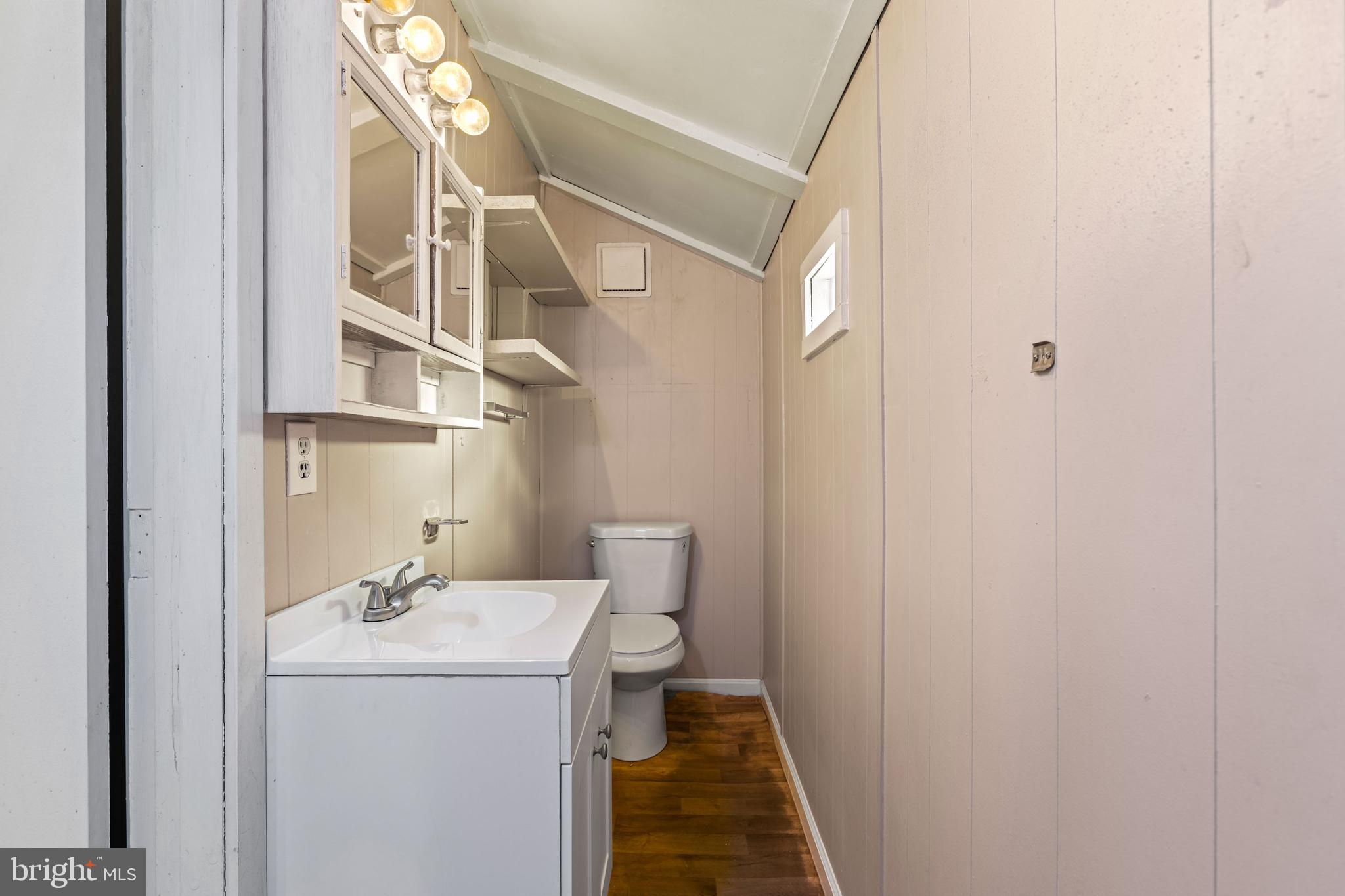 5030 Silver Spring Road Perry Hall, MD 21128 - Photo 81 of 97 a bathroom with a sink a toilet and shower