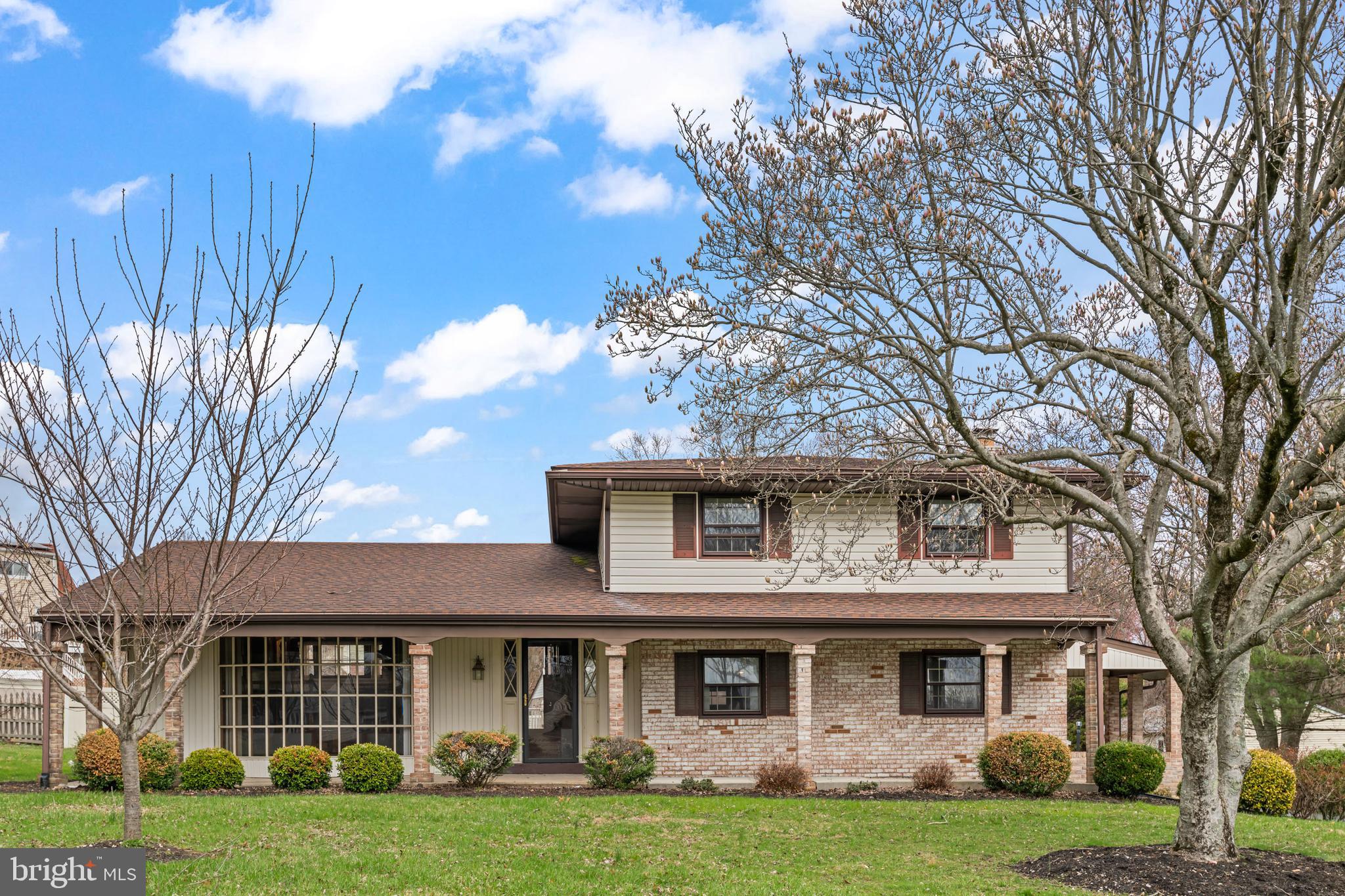 5030 Silver Spring Road Perry Hall, MD 21128 - Photo 91 of 97 a front view of a residential apartment building with a yard