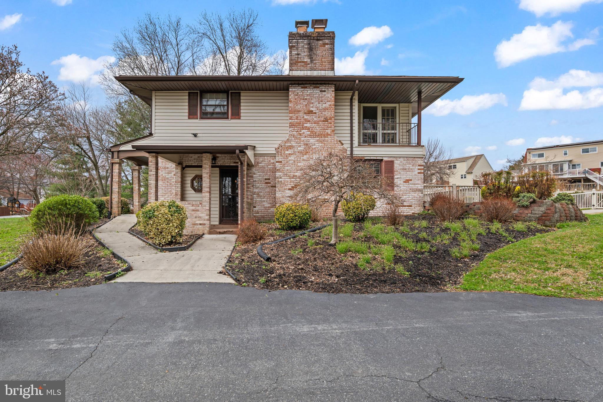 5030 Silver Spring Road Perry Hall, MD 21128 - Photo 92 of 97 a view of a house with a yard and plants
